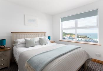 Bedroom 2 has a king size bed and lovely sea views to wake up to.