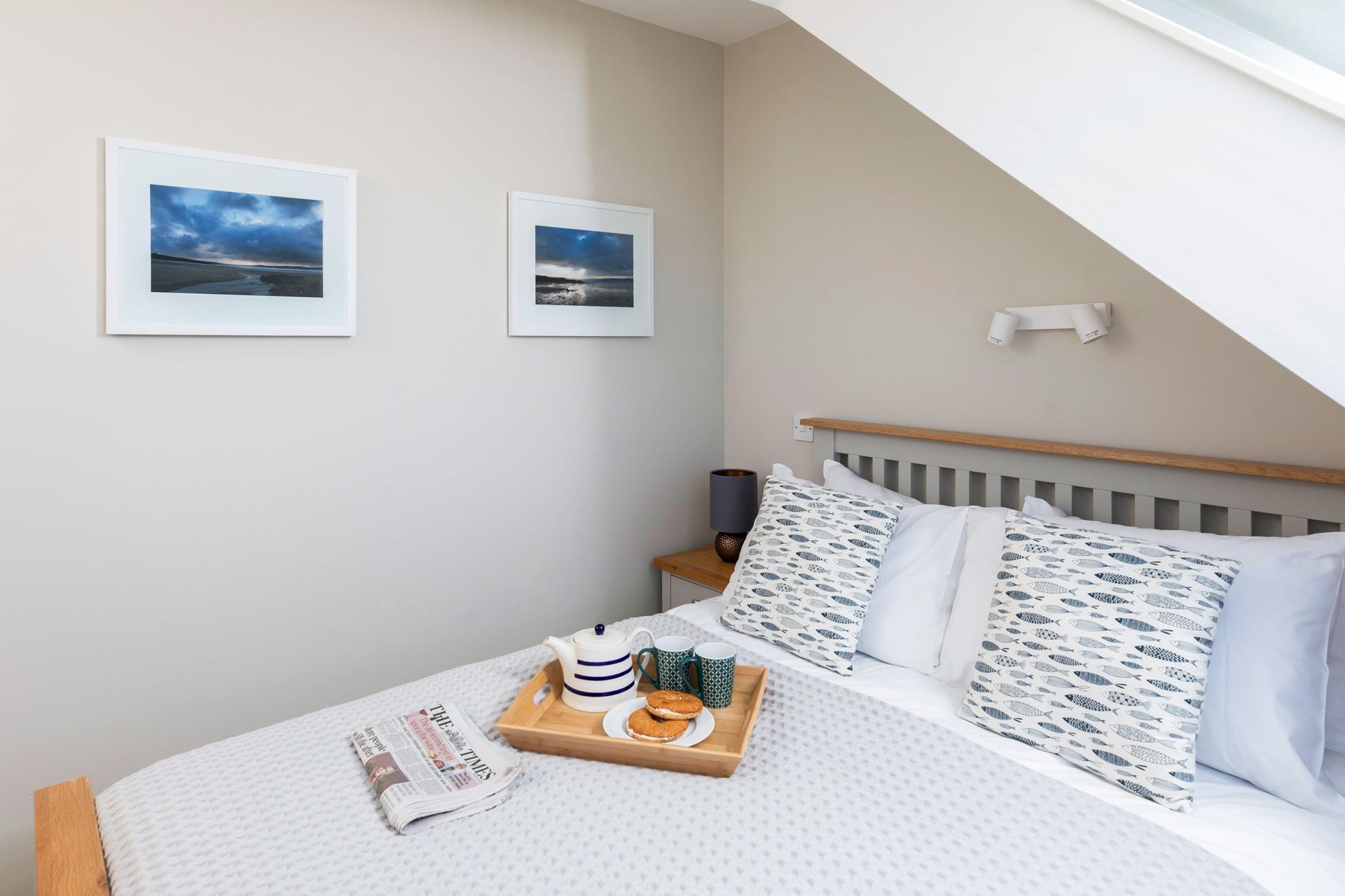 Calming cream and blues create a serene bedroom.