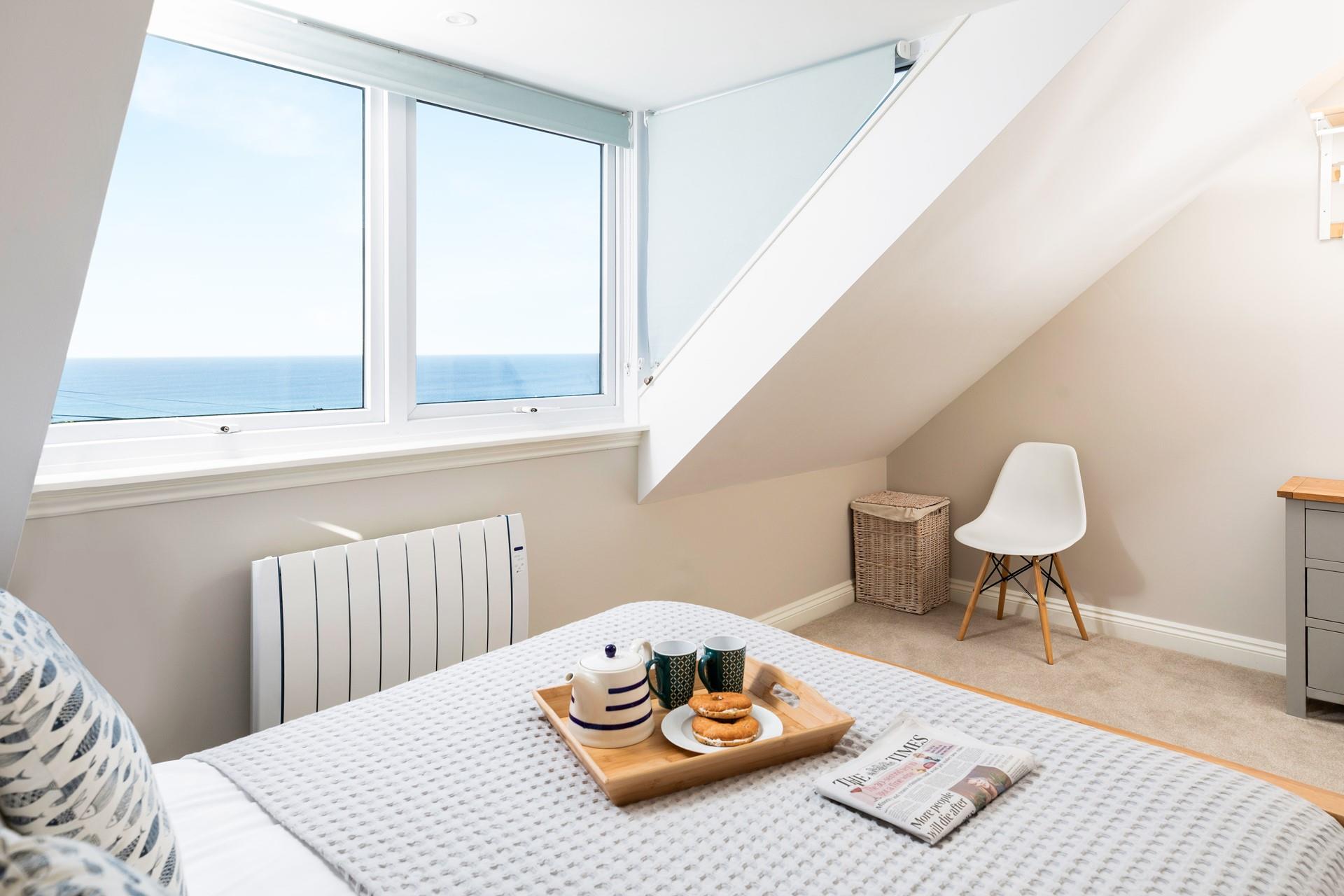 Bedroom 3 also boasts lovely sea views.