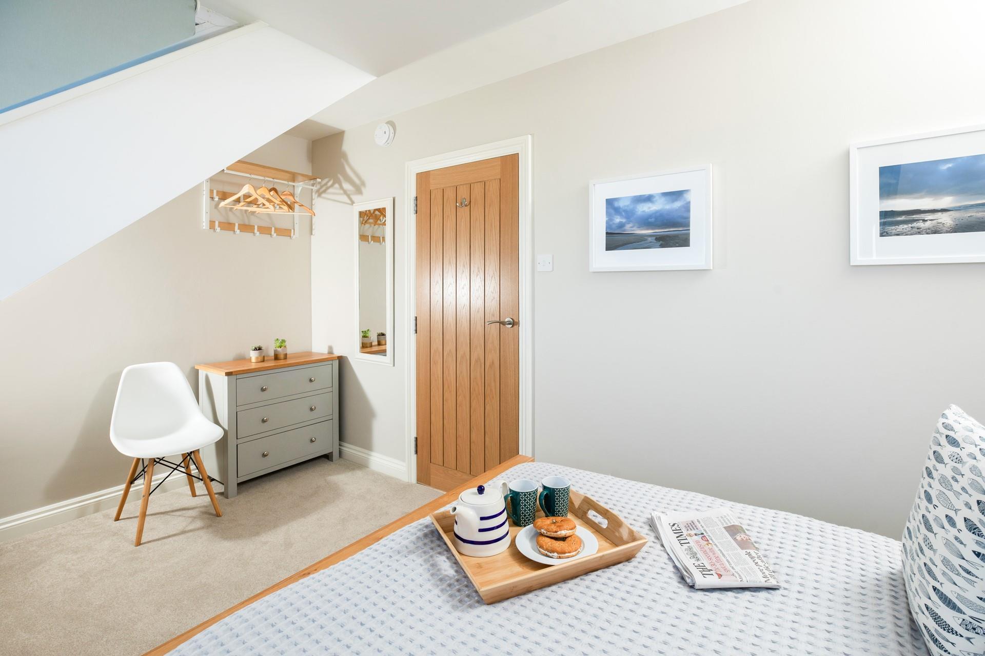 There's plenty of space for your holiday wardrobe with a hanging rail and drawers.