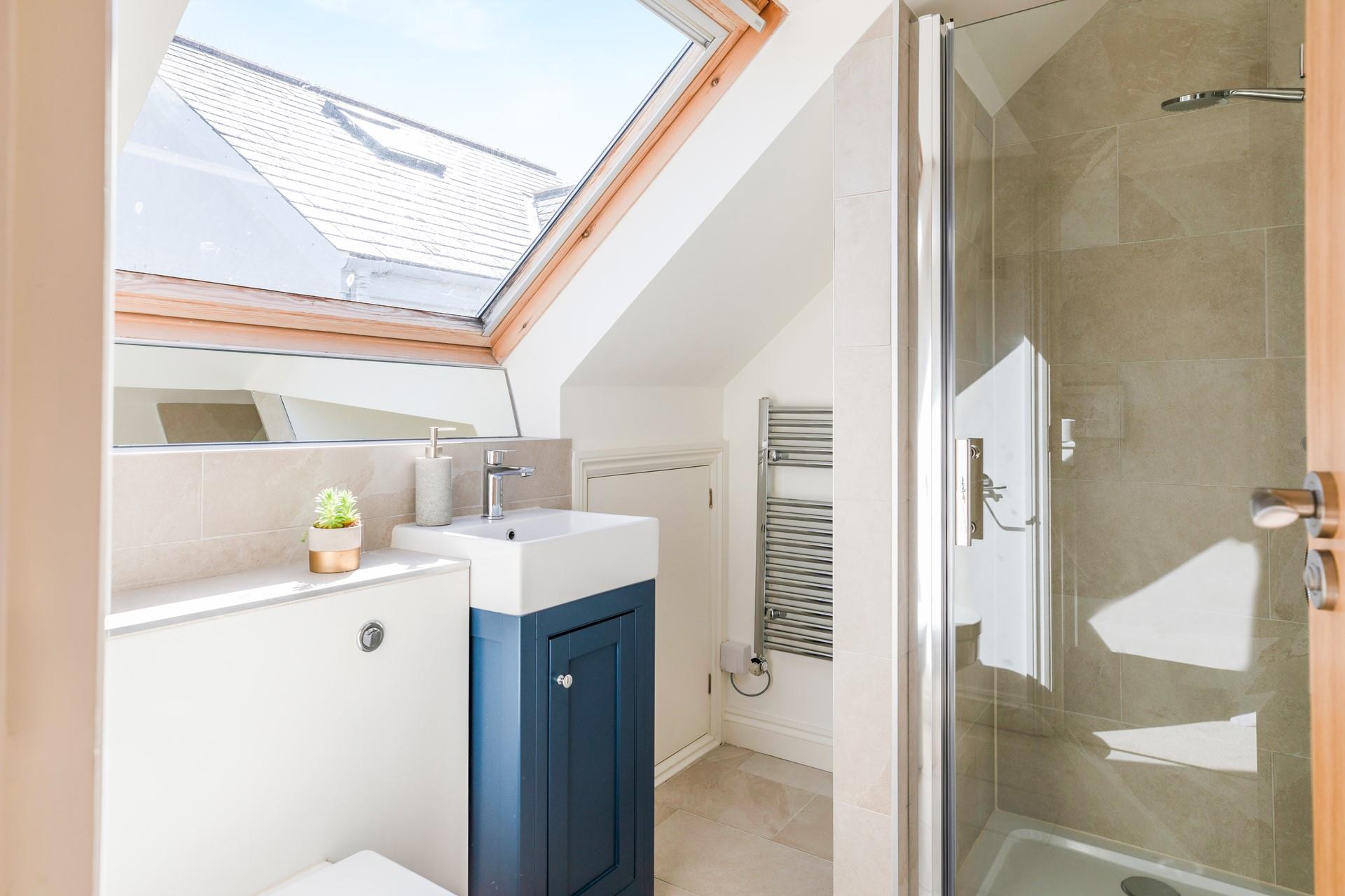 Wash off your sandy toes in the shower after a day on Porthmeor beach.