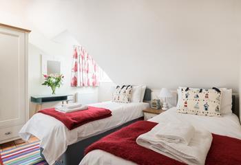 Bedroom 2 has twin beds, ideal for adults or children.