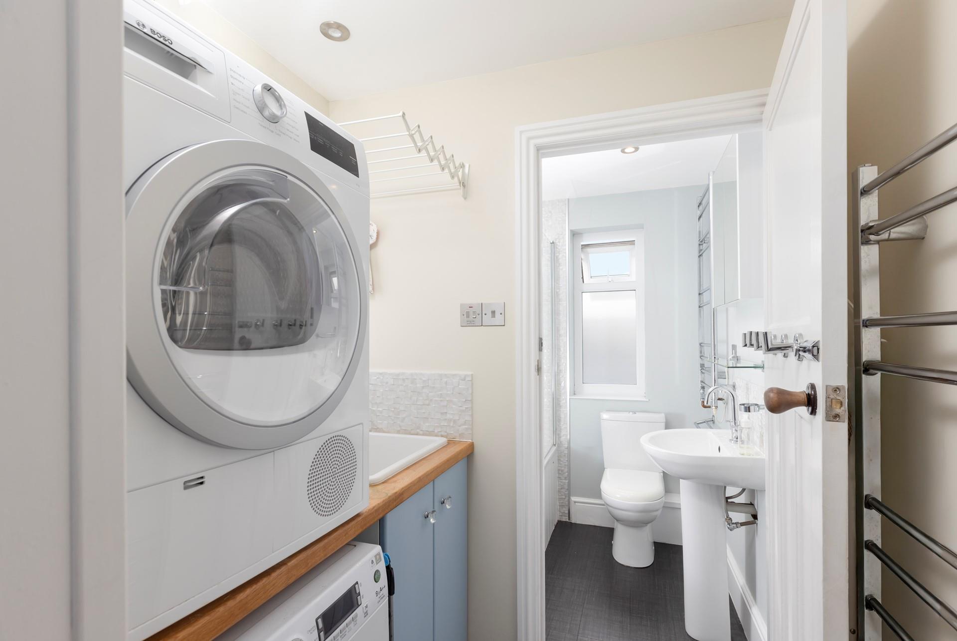 Wash your beach gear in the handy utility room.