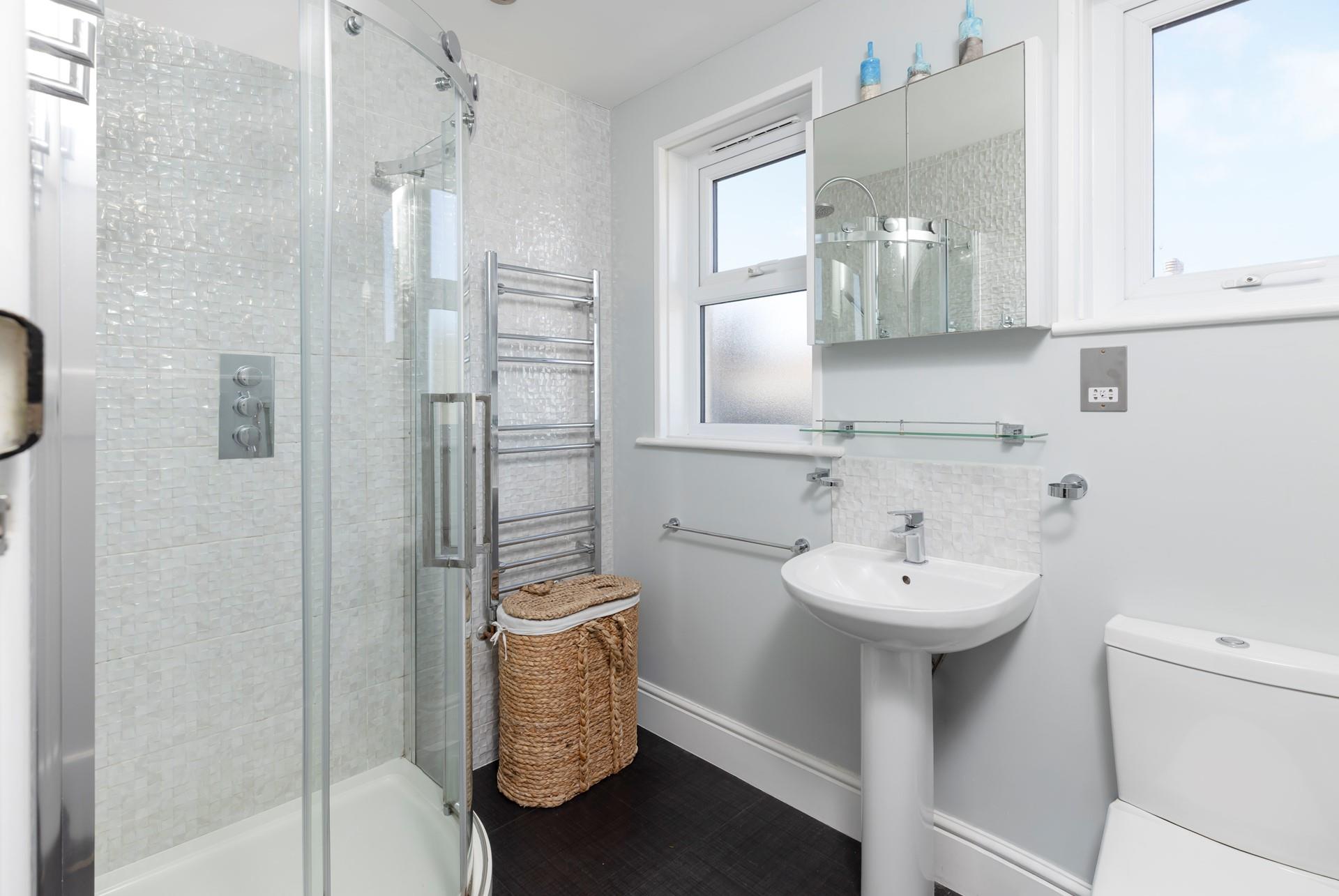 The shower room offers extra space for getting ready in the mornings.