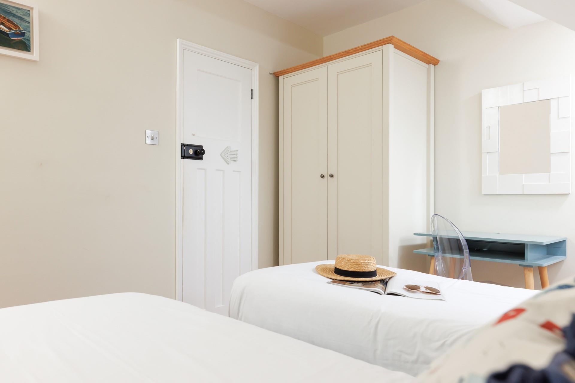 Plenty of wardrobe space for your beachwear.