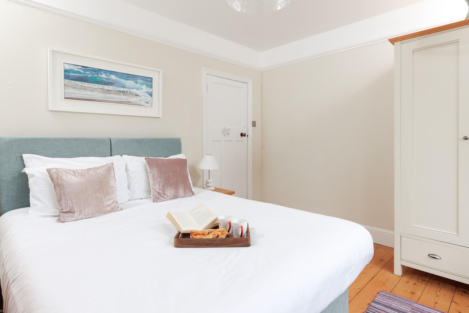 There's a spacious wardrobe for hanging up your holiday best!