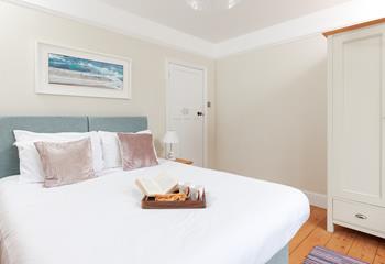 There's a spacious wardrobe for hanging up your holiday best!