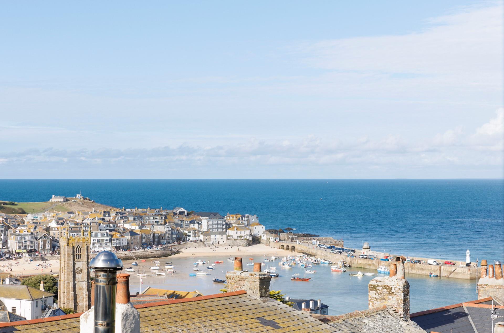 Look out across the rooftops to St Ives picturesque harbour.