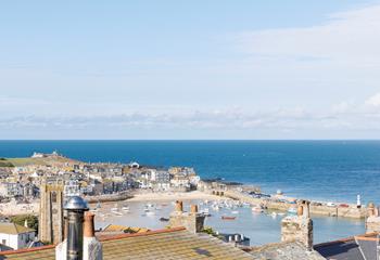 Look out across the rooftops to St Ives picturesque harbour.