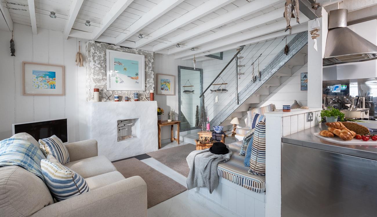 After a day spent sunbathing and dipping in the sea on Porthmeor beach, come back to relax in your cosy living area.