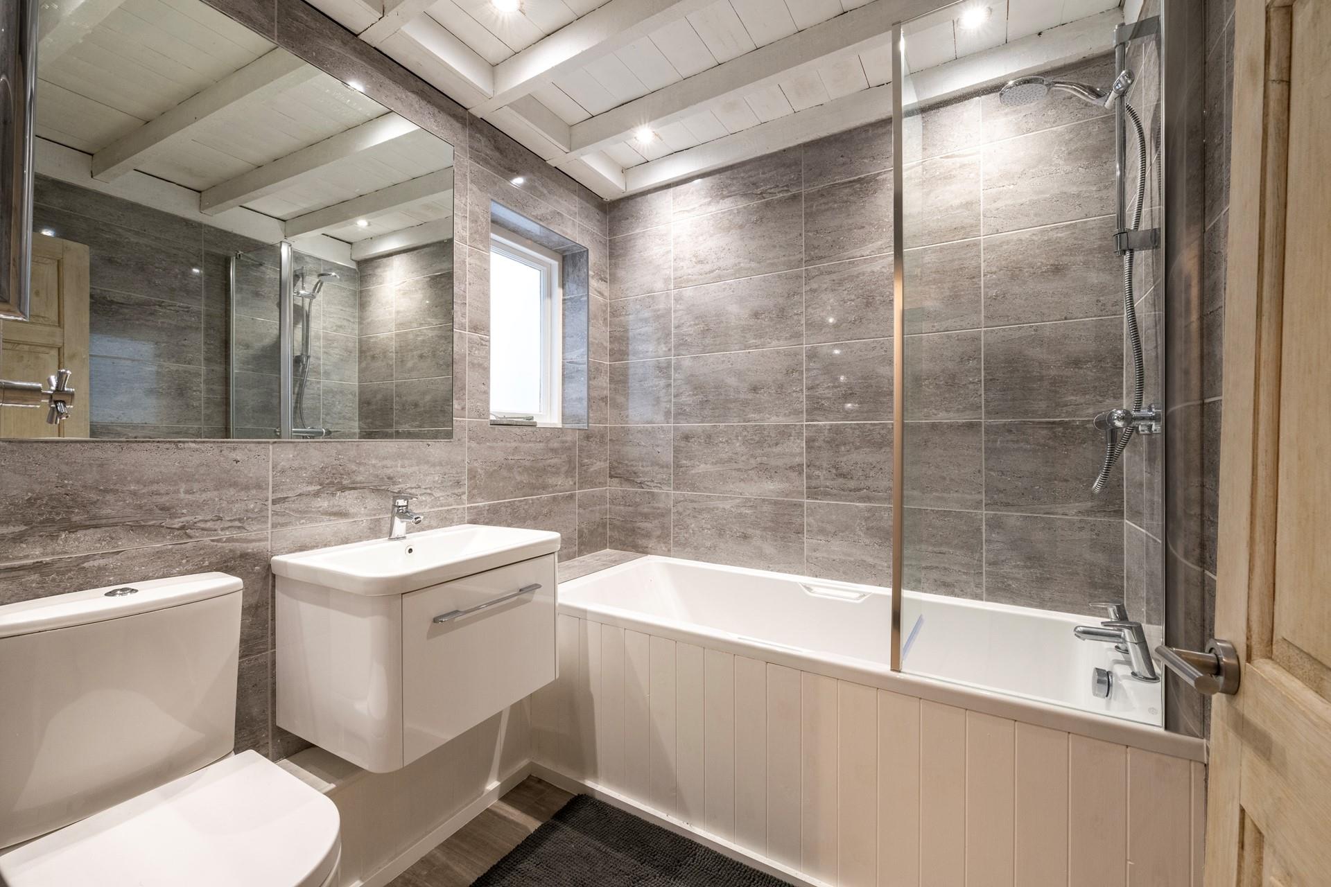 The bath is perfect for a relaxing soak after a day at the beach.