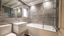 The bath is perfect for a relaxing soak after a day at the beach.