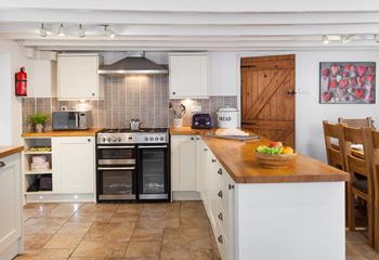 The kitchen is well-equipped with a large range cooker, perfect for those indulgent holiday breakfasts!