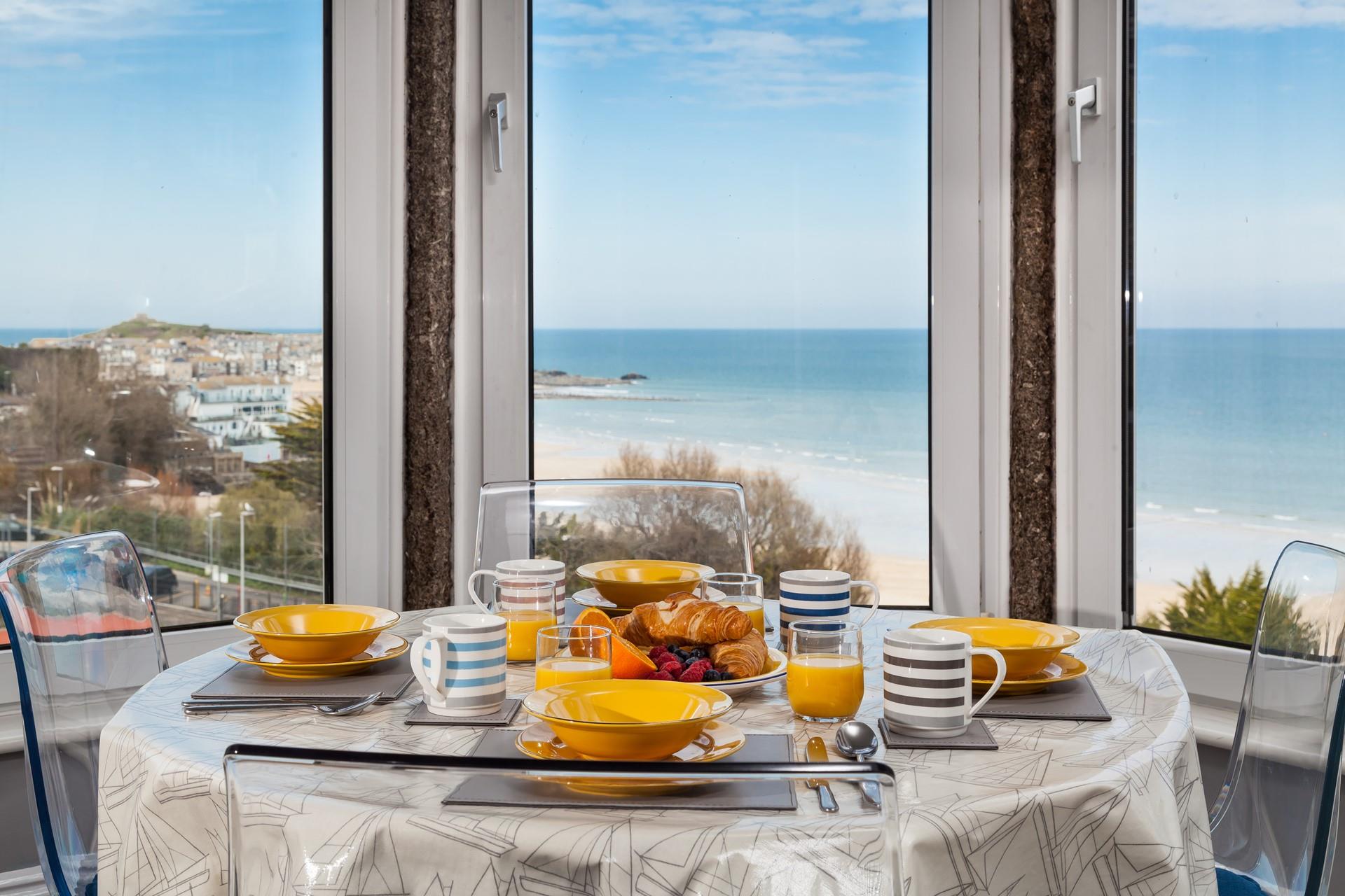 Start your day with a morning cup of coffee whilst watching the sunrise over the waves.