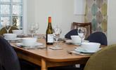 Buy your favourite bottle of wine and enjoy a tasty meal around the dining table. - Thumbnail Image