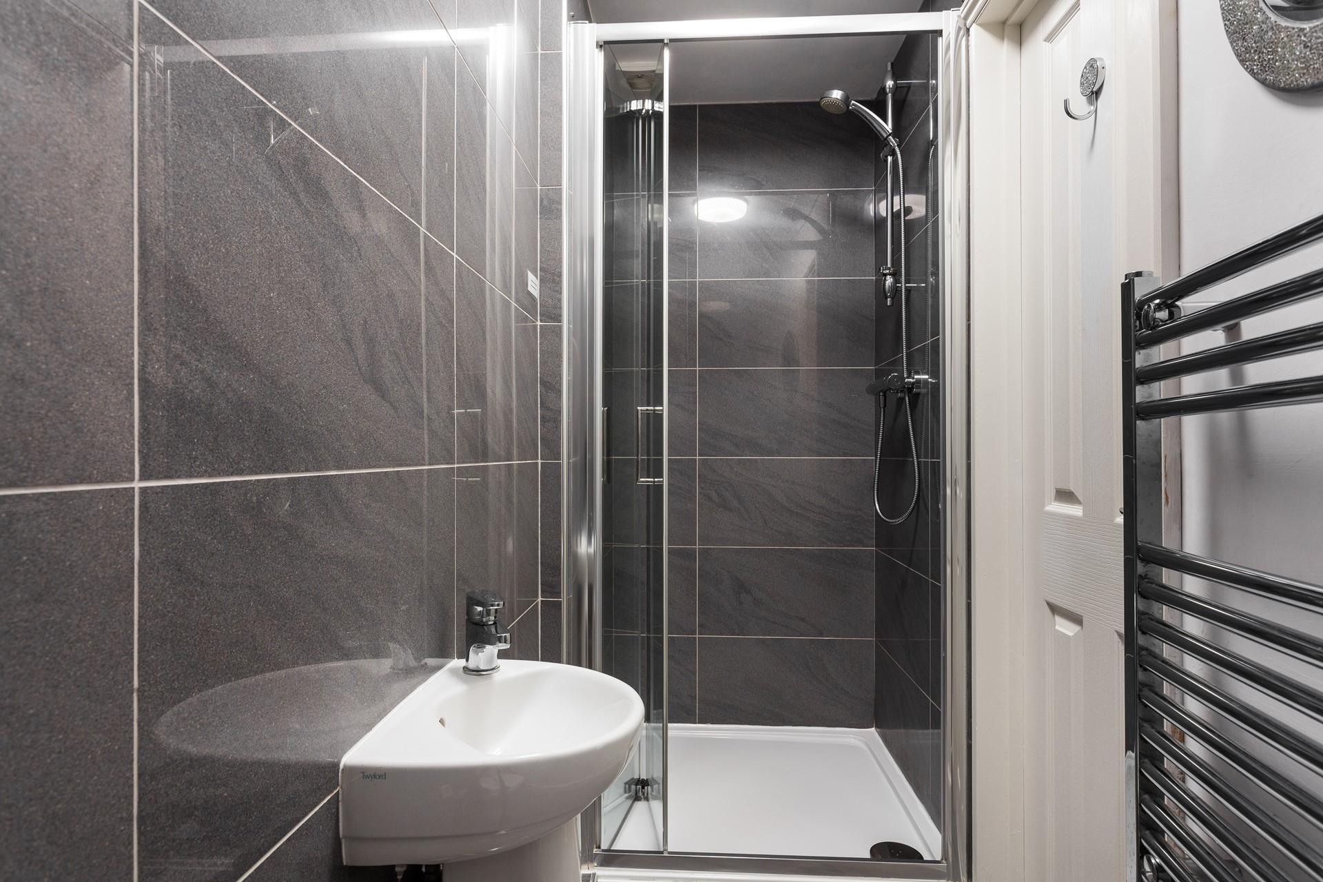 Wash off the sand in the modern shower room.