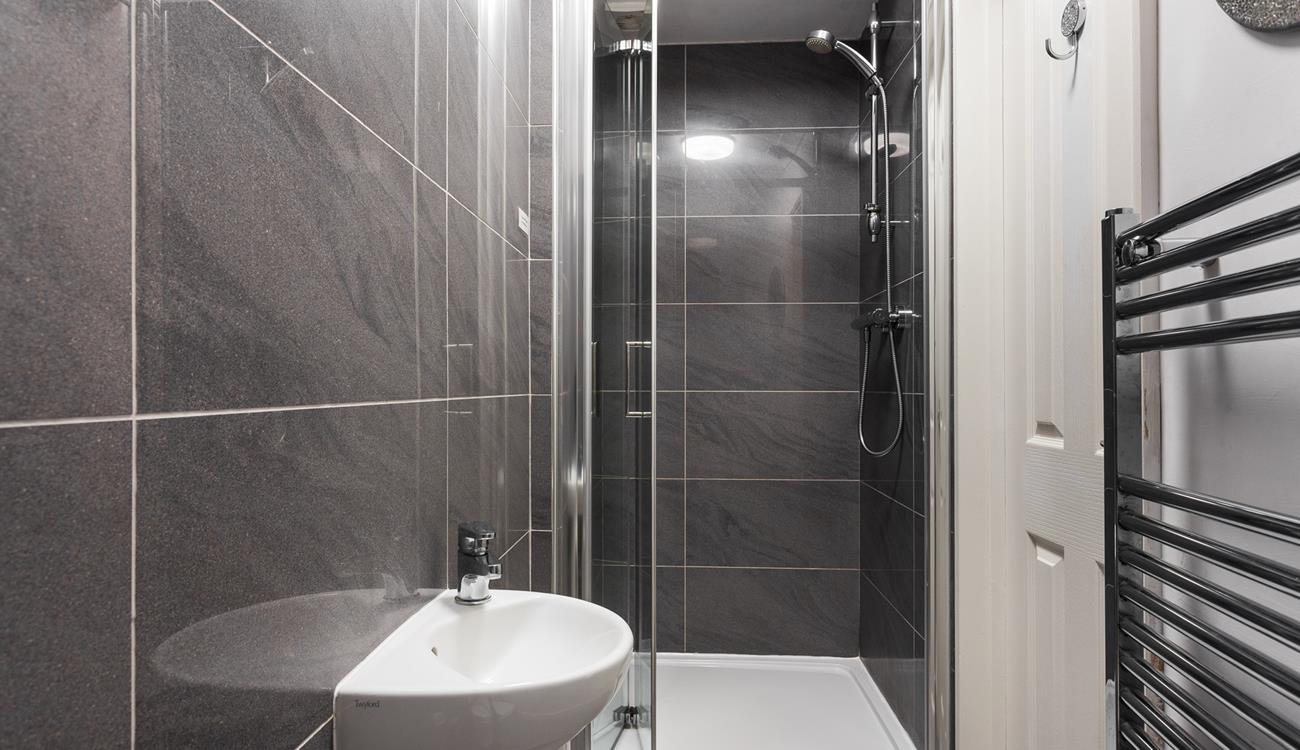 Wash off the sand in the modern shower room.
