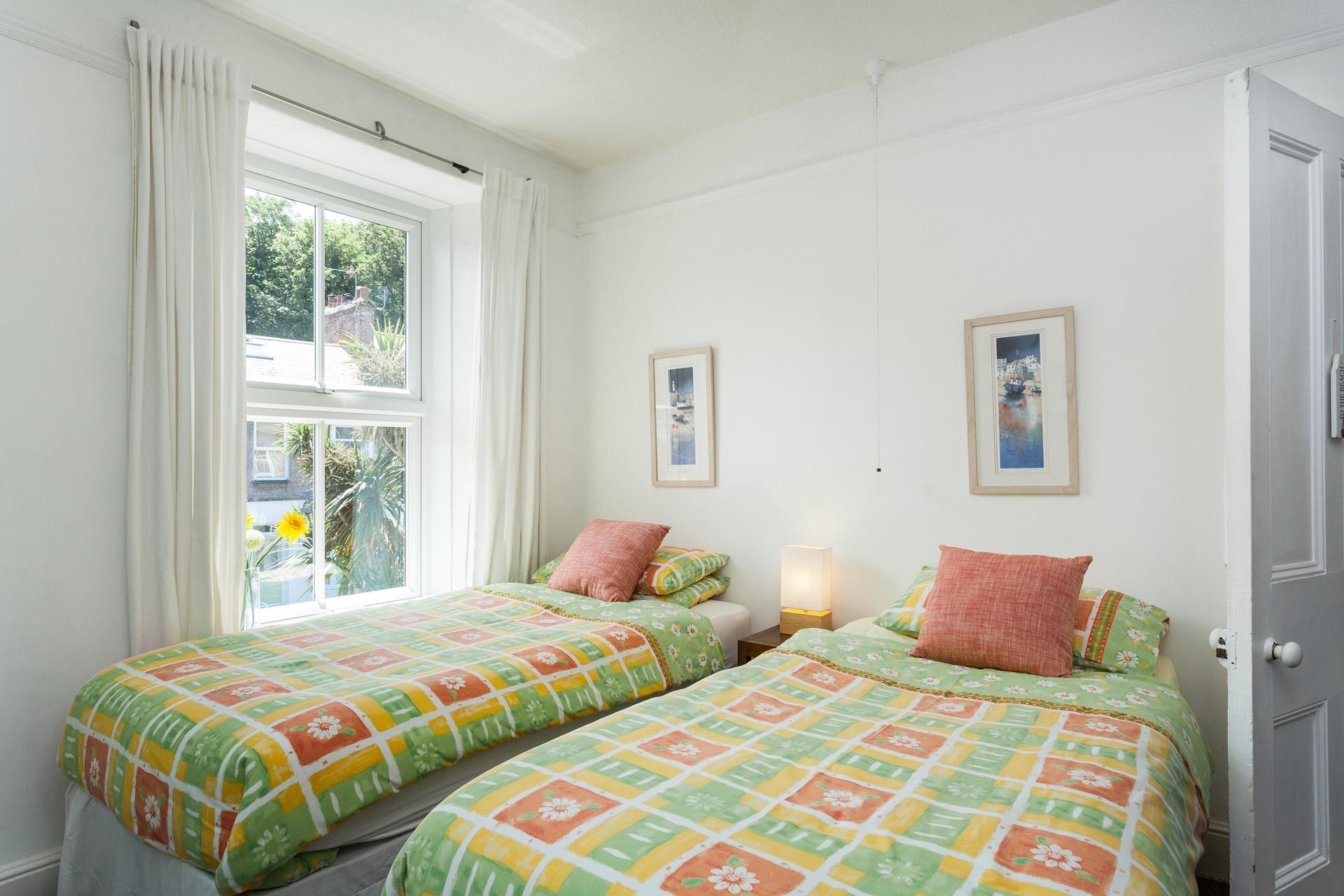 The twin bedroom is located on the first floor and is perfect for adults or children to drift off to sleep each night.