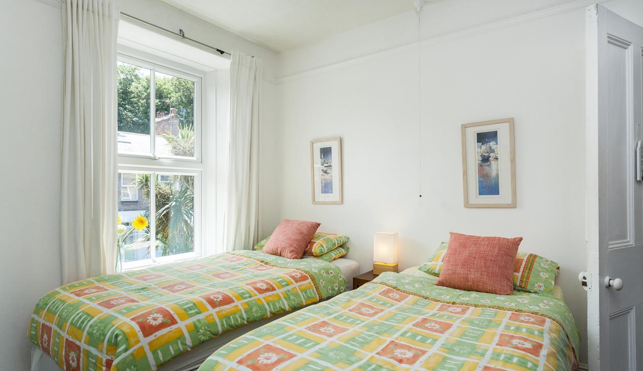 The twin bedroom is located on the first floor and is perfect for adults or children to drift off to sleep each night.