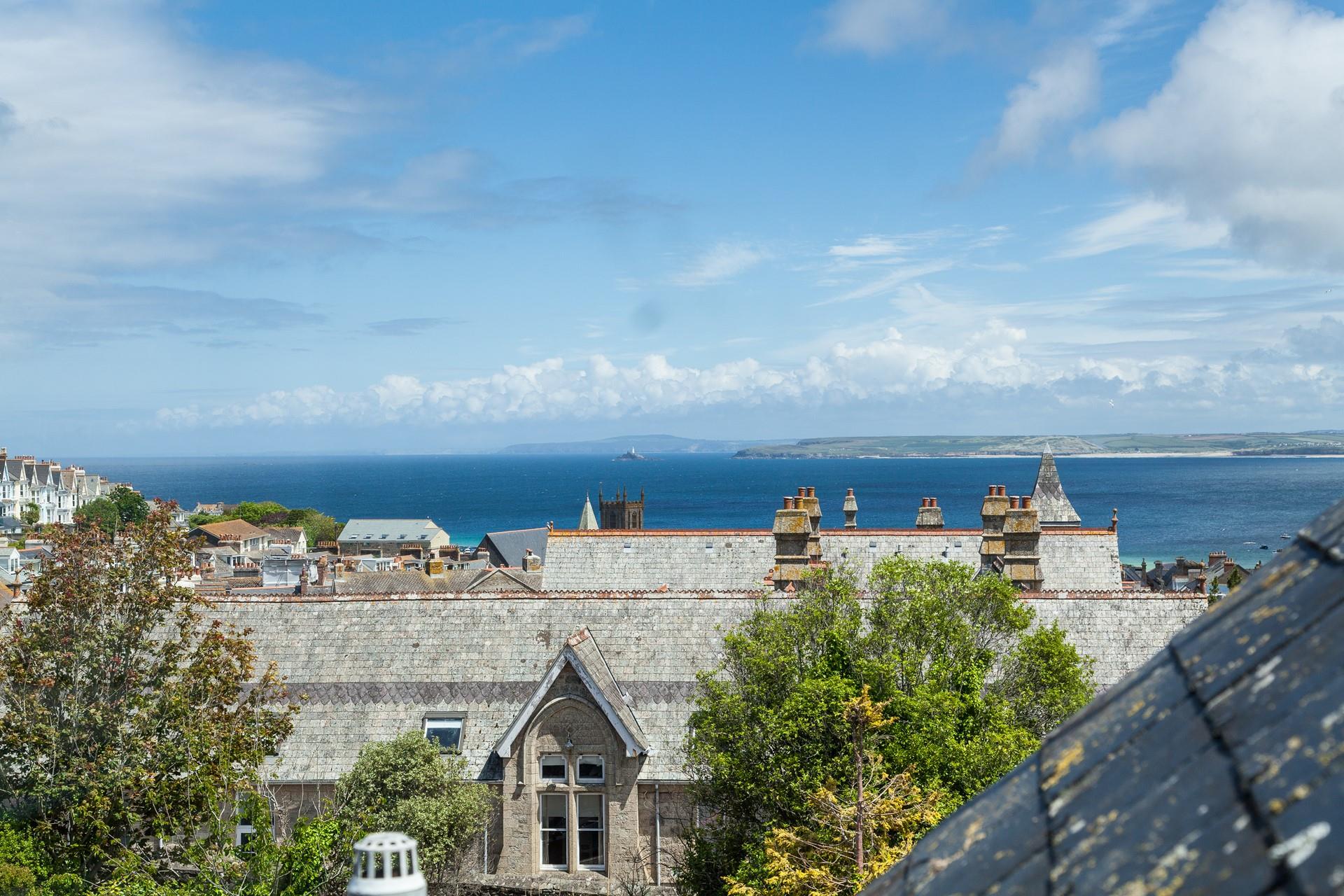 The property has sea views over the quirky roofs of St Ives.