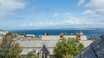 The property has sea views over the quirky roofs of St Ives.