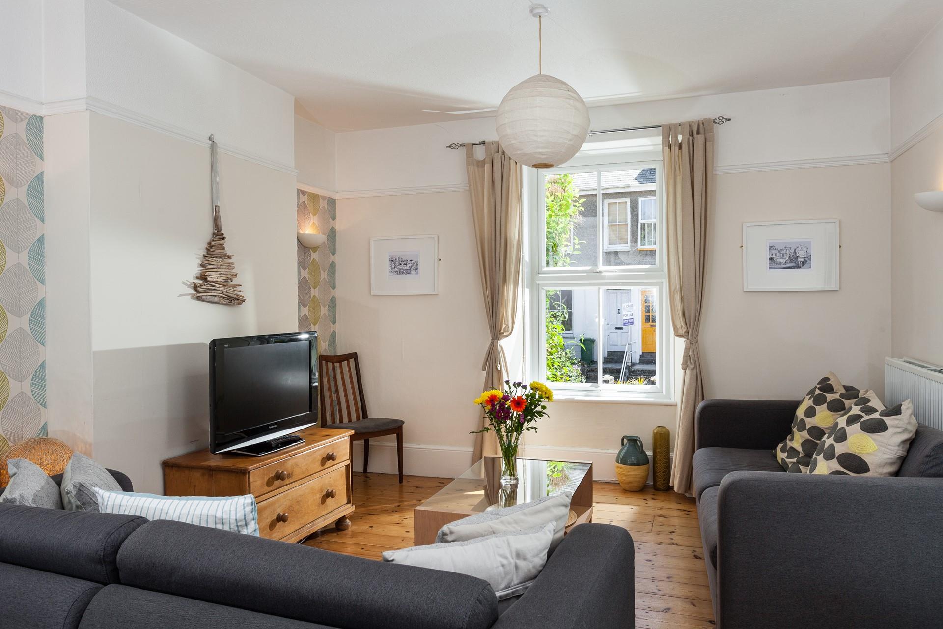 The living room is ideal for family gatherings after you've enjoyed a day out at a family attraction.