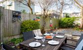 Spend your evenings indulging in al fresco meals in the sun trap garden. - Thumbnail Image