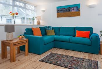 The vibrant living area brings all the fun and magic of the seaside indoors.