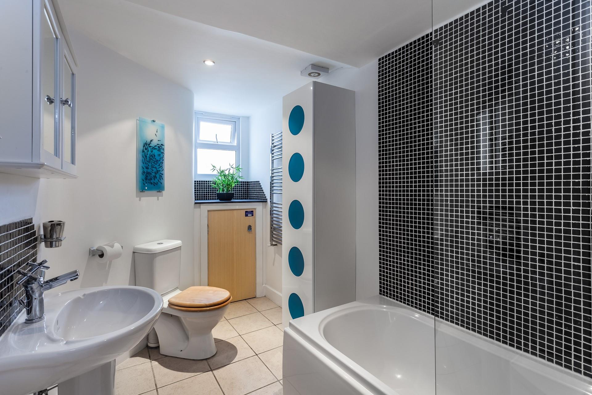 Wash off sandy toes from a day on the beach in the bathroom.