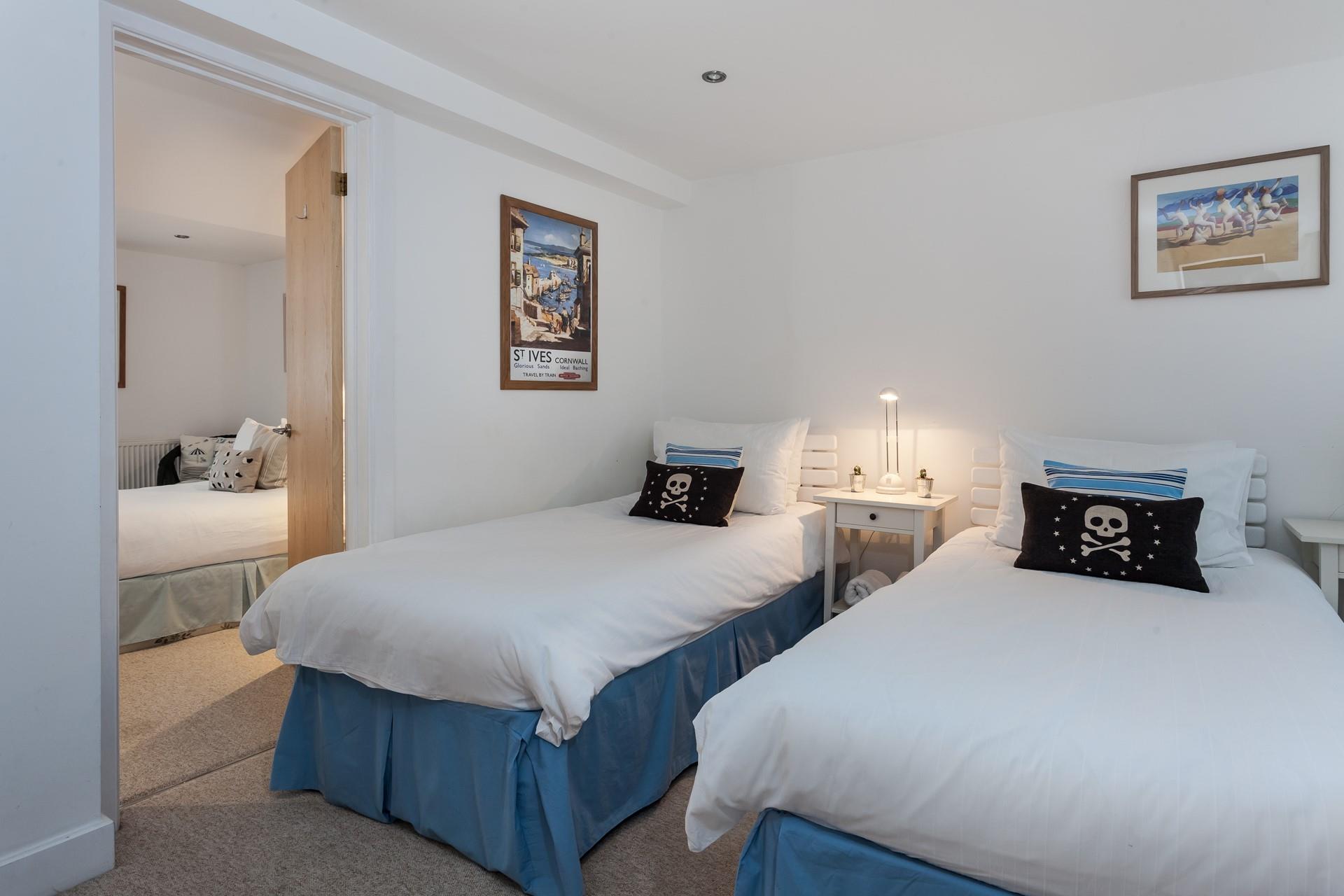The bedrooms are adjoined, a particularly handy feature for families with younger children.