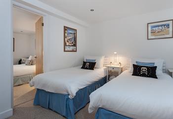 The bedrooms are adjoined, a particularly handy feature for families with younger children.