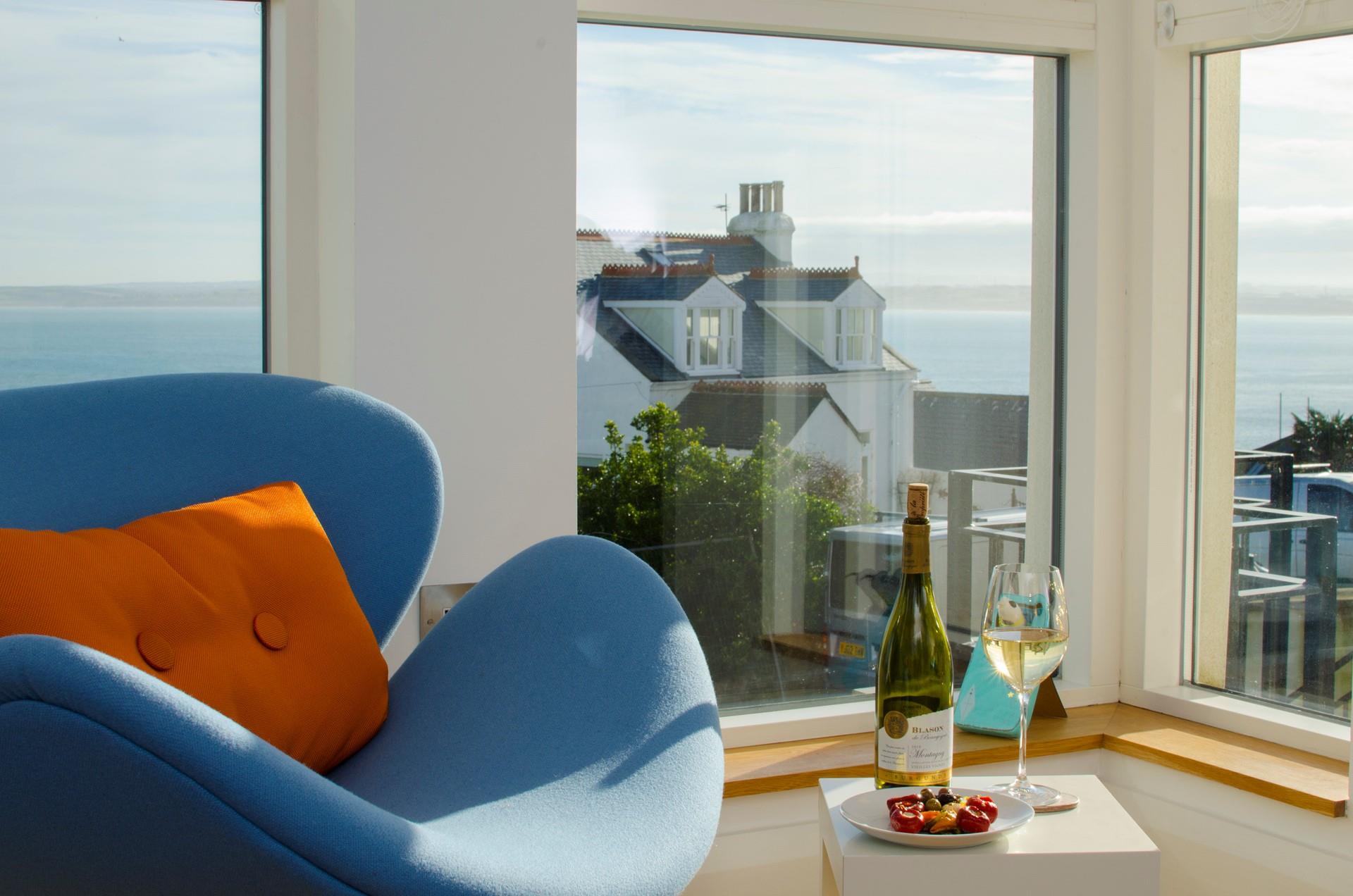 Open a bottle of wine to sip as the sun comes down.