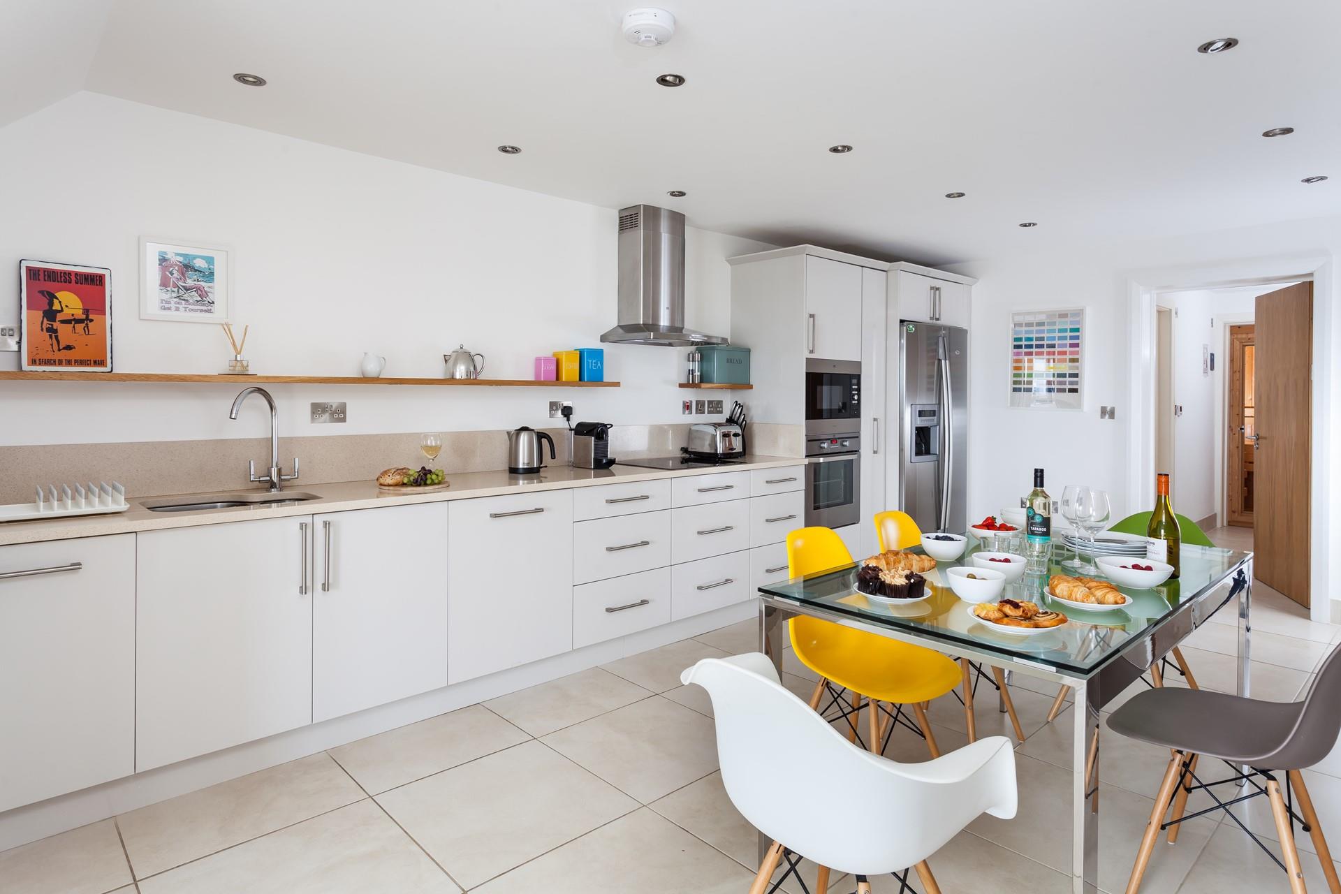 The kitchen is large and well-equipped to cook tasty meals.