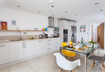 The kitchen is large and well-equipped to cook tasty meals.