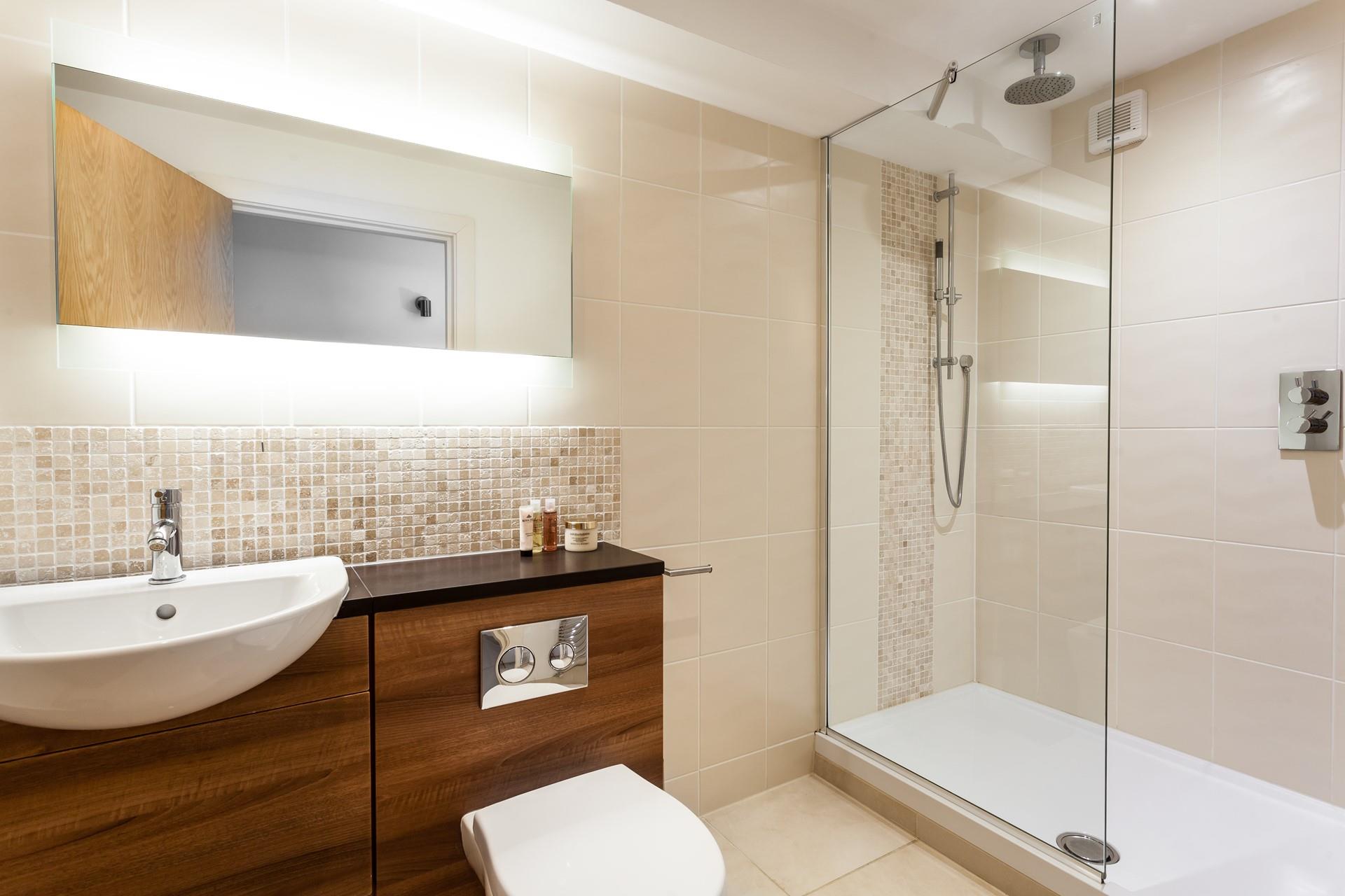 The ensuite has a large shower to wash off the sand after a beach day.