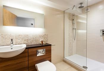 The ensuite has a large shower to wash off the sand after a beach day.