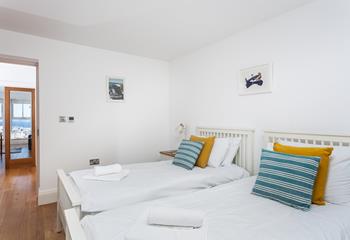The twin beds are perfect for kids or adults to drift off for a cosy night's sleep.