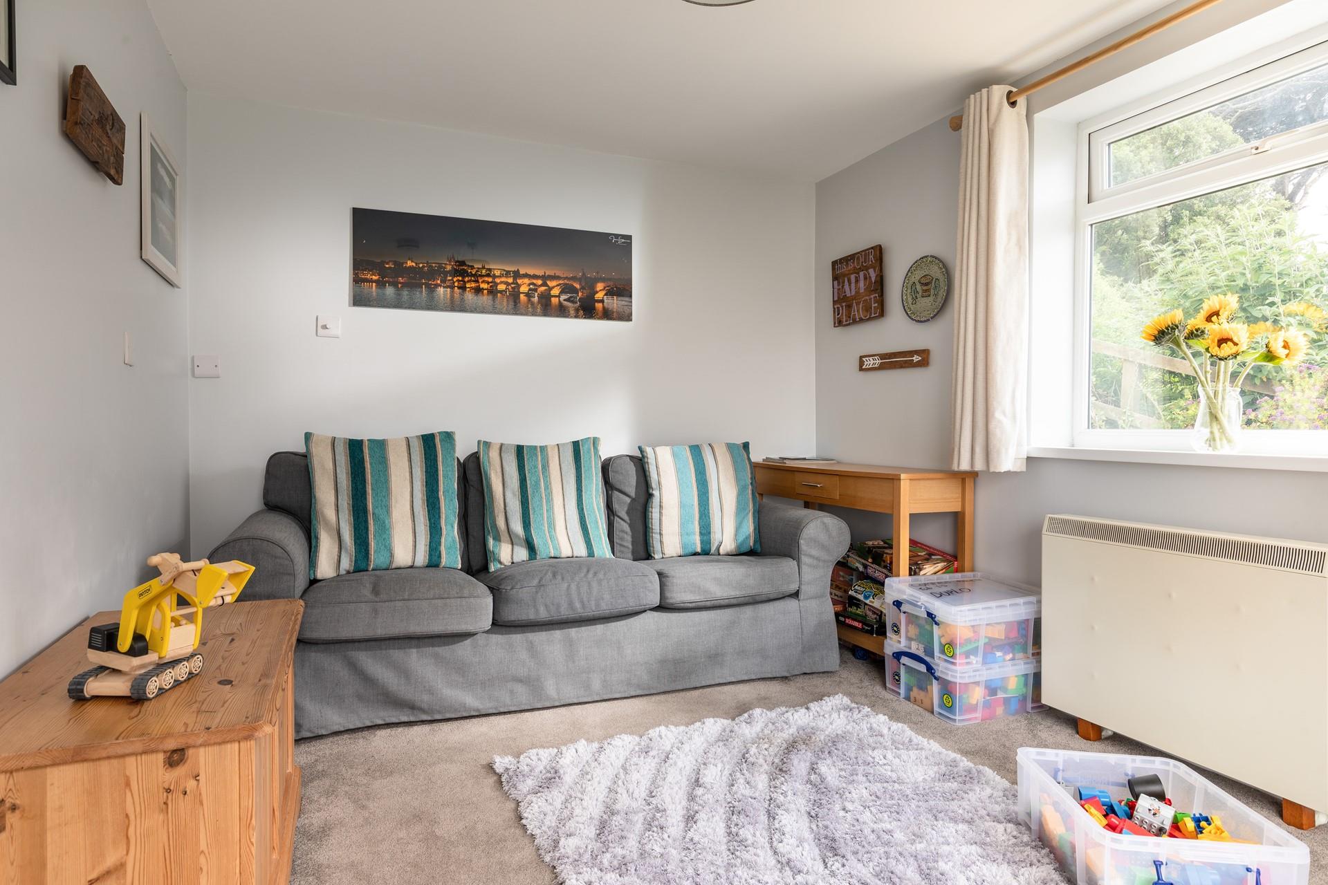 Children will love playing in the toy-filled snug.