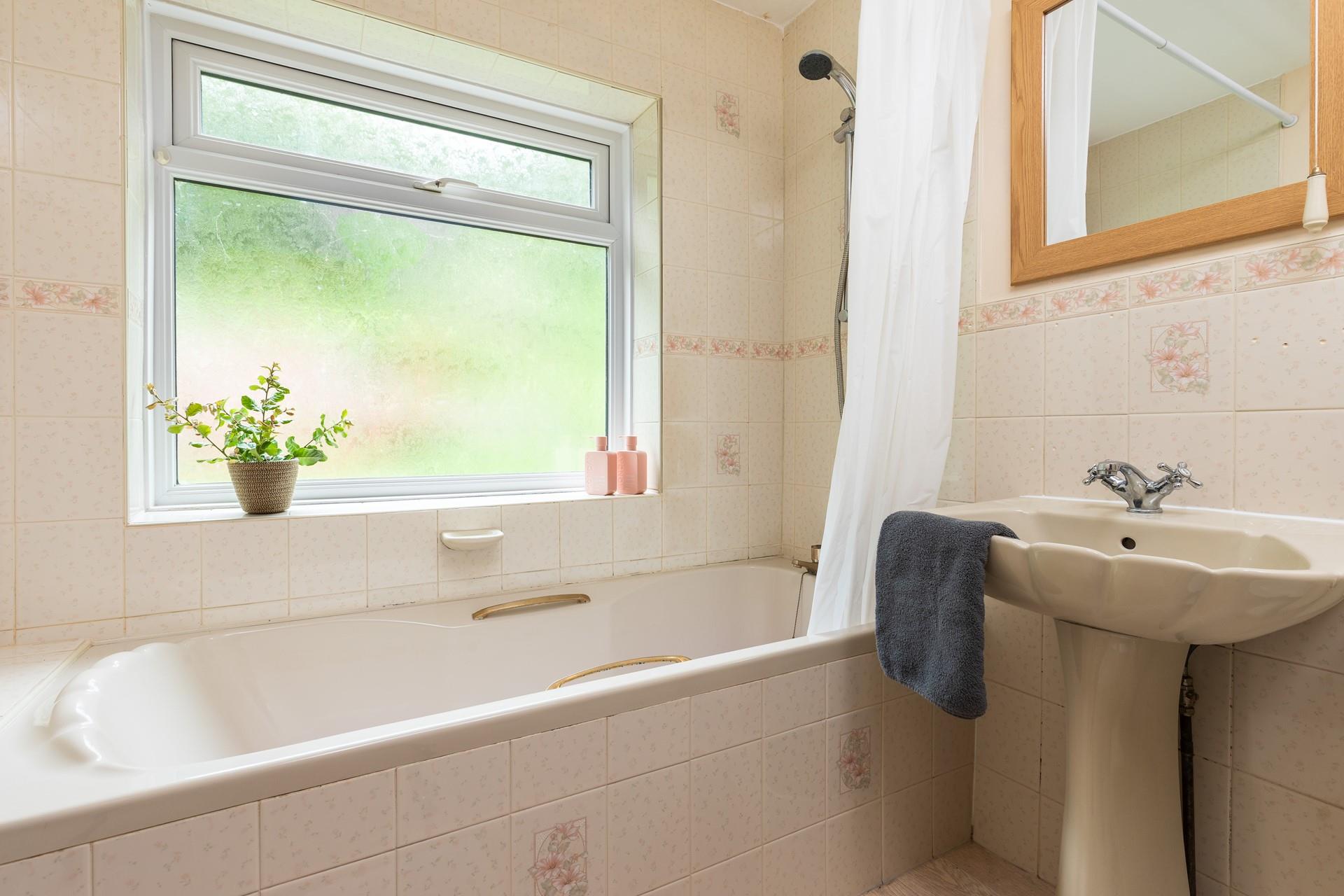 The family bathroom has a bath with a shower, so you can have a quick rinse or long, relaxing bath.