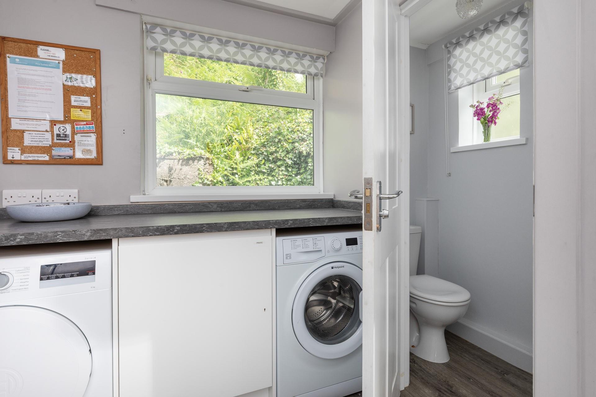 You'll find a handy utility room and a downstairs cloakroom.
