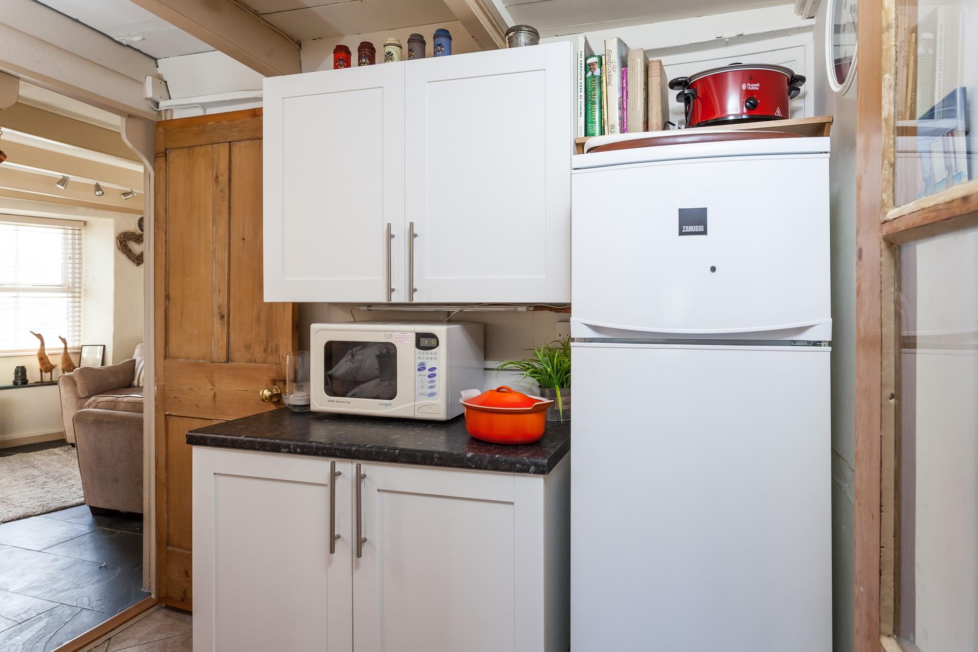 The kitchen is the perfect space to prepare a delicious meal.