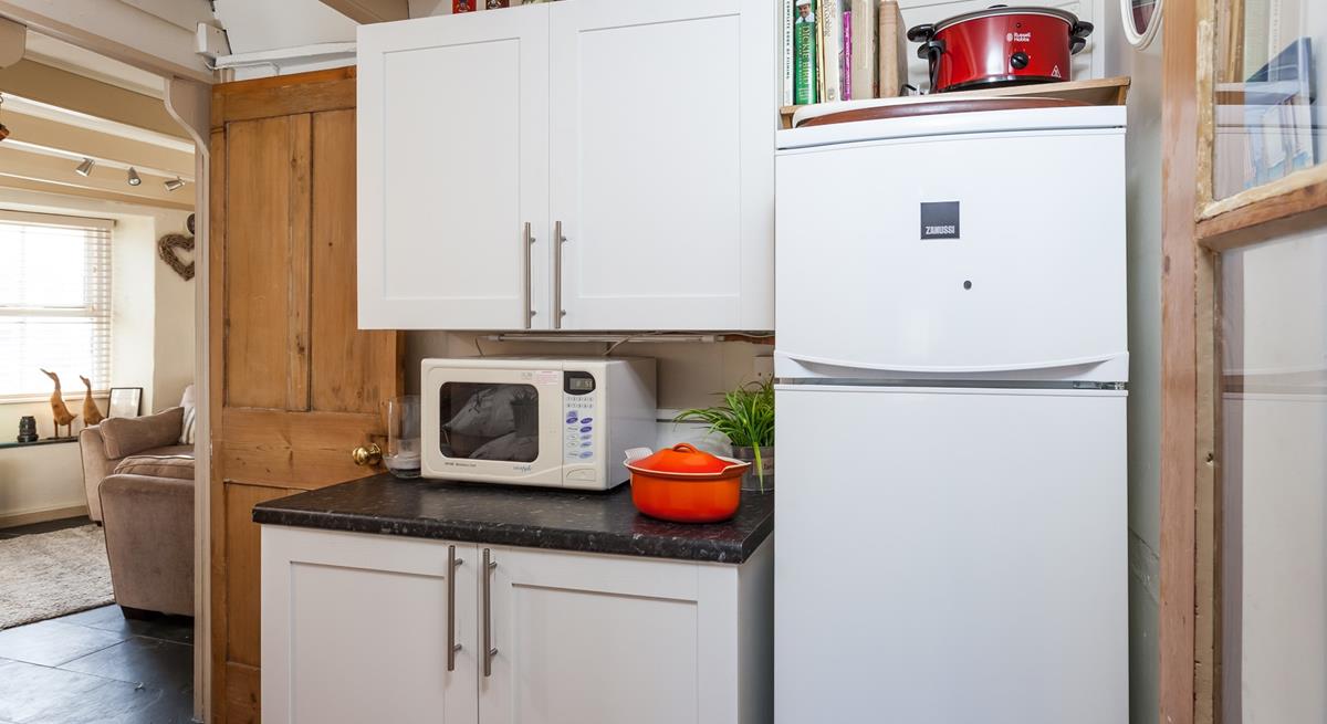 The kitchen is the perfect space to prepare a delicious meal.