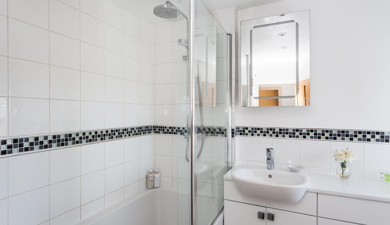 Start your day right with a hot shower and then head out to beautiful Porthcurno beach.