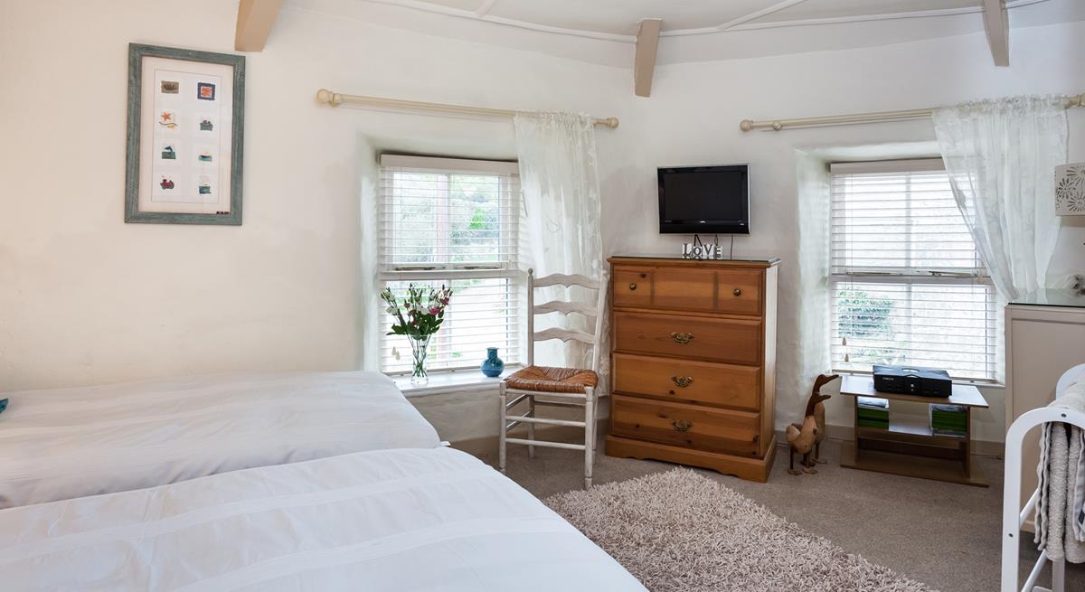 There is ample space in the dual-aspect, twin bedroom.