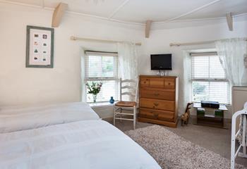 There is ample space in the dual-aspect, twin bedroom.