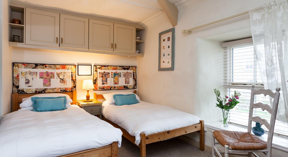 The cosy twin bedroom is the perfect space for the children to rest after busy days.