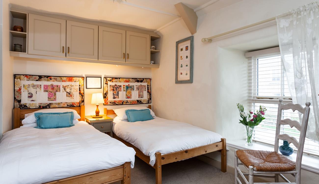 The cosy twin bedroom is the perfect space for the children to rest after busy days.