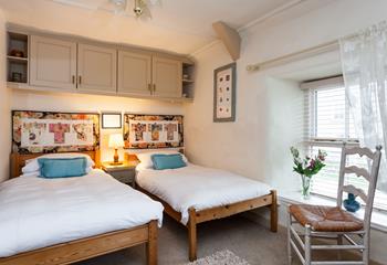 The cosy twin bedroom is the perfect space for the children to rest after busy days.