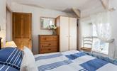 Plenty of storage for guests in the cosy, double bedroom. - Thumbnail Image