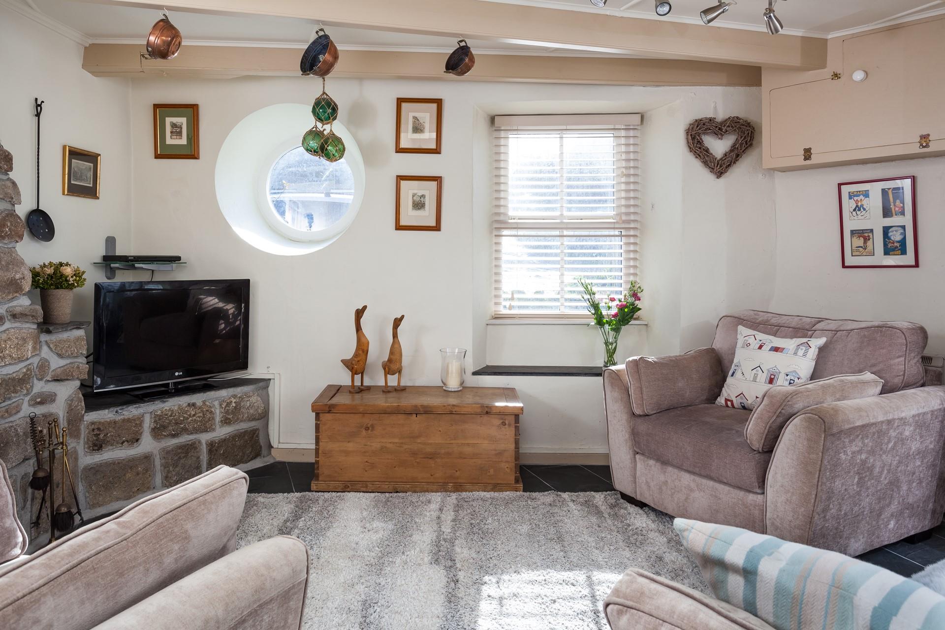 Relax in your cosy sitting room spending your evening with a good film on the TV.